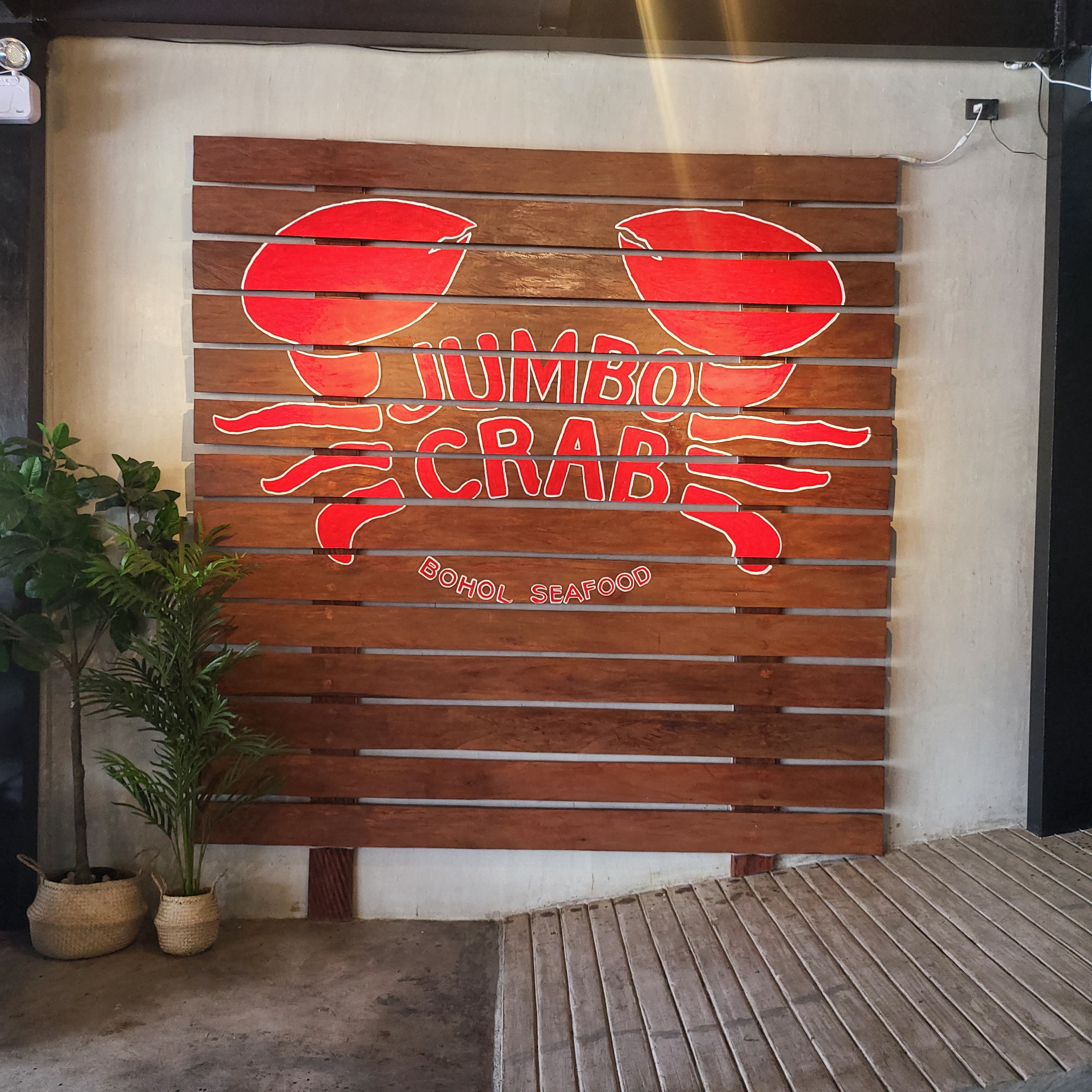 Jumbo Crab logo wall